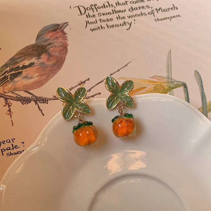 the persimmon earrings disco reign